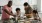 a family preparing food in the kitchen