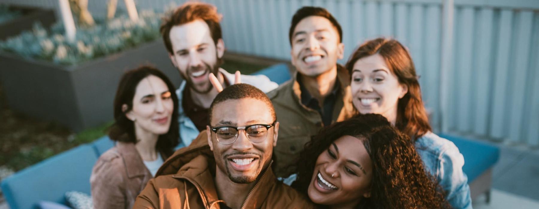 a group of people posing for a photo