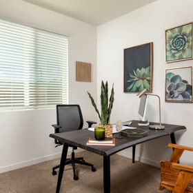 Refined spaces to match your style office with seating desk and window