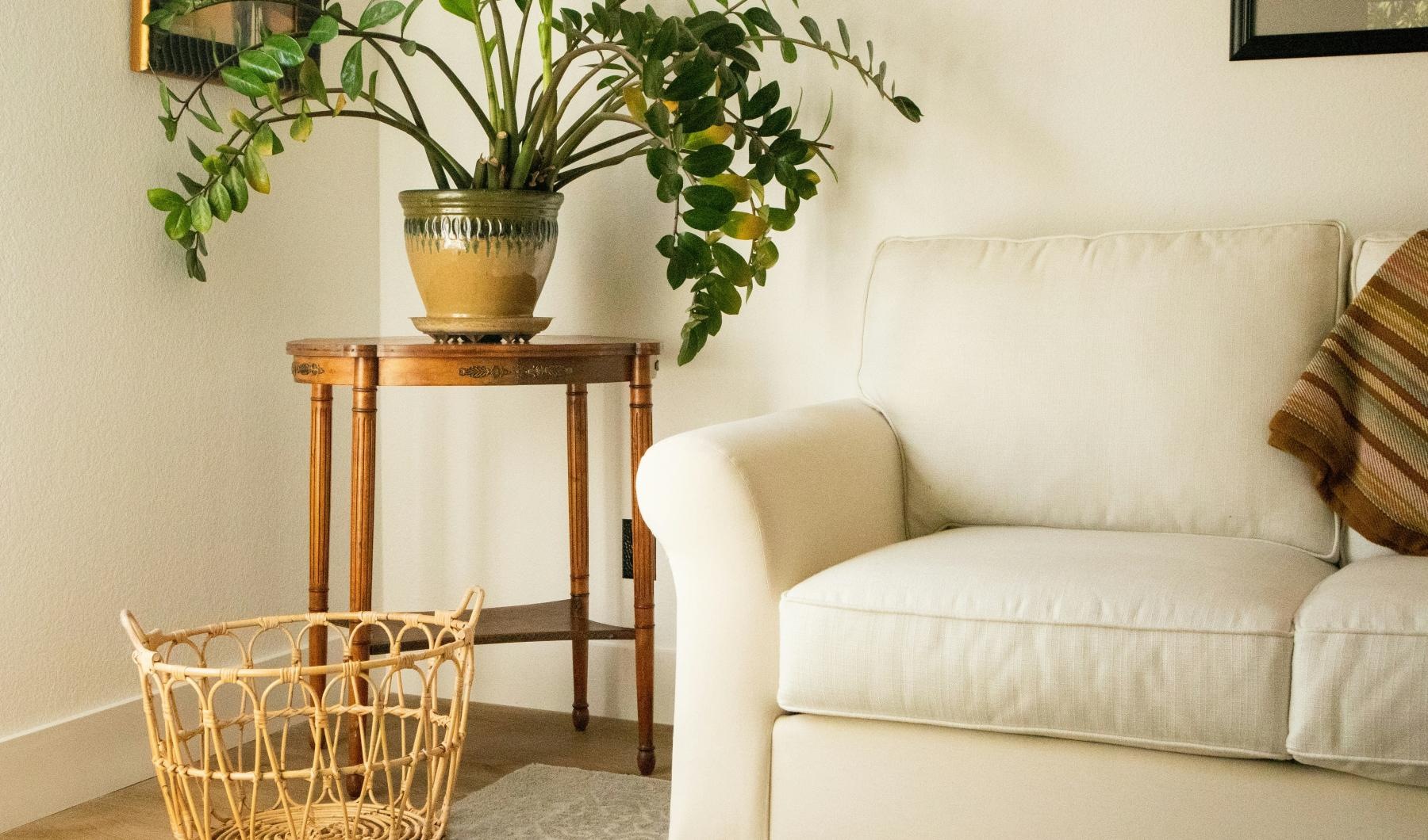 a white couch and a table